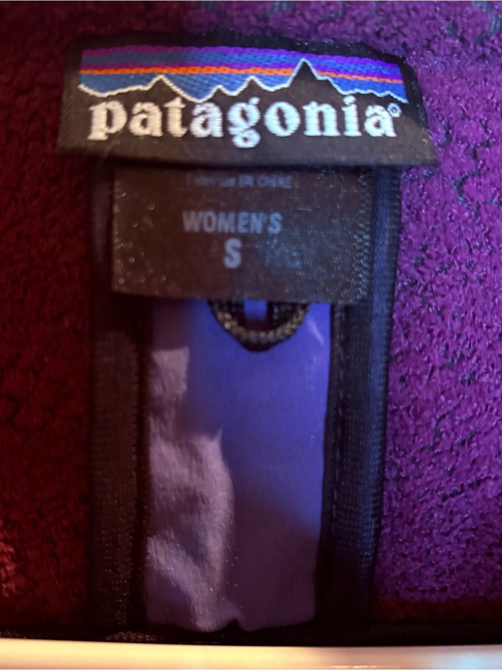 Patagonia Women's Lavender Softshell Ski Jacket with zippered pockets